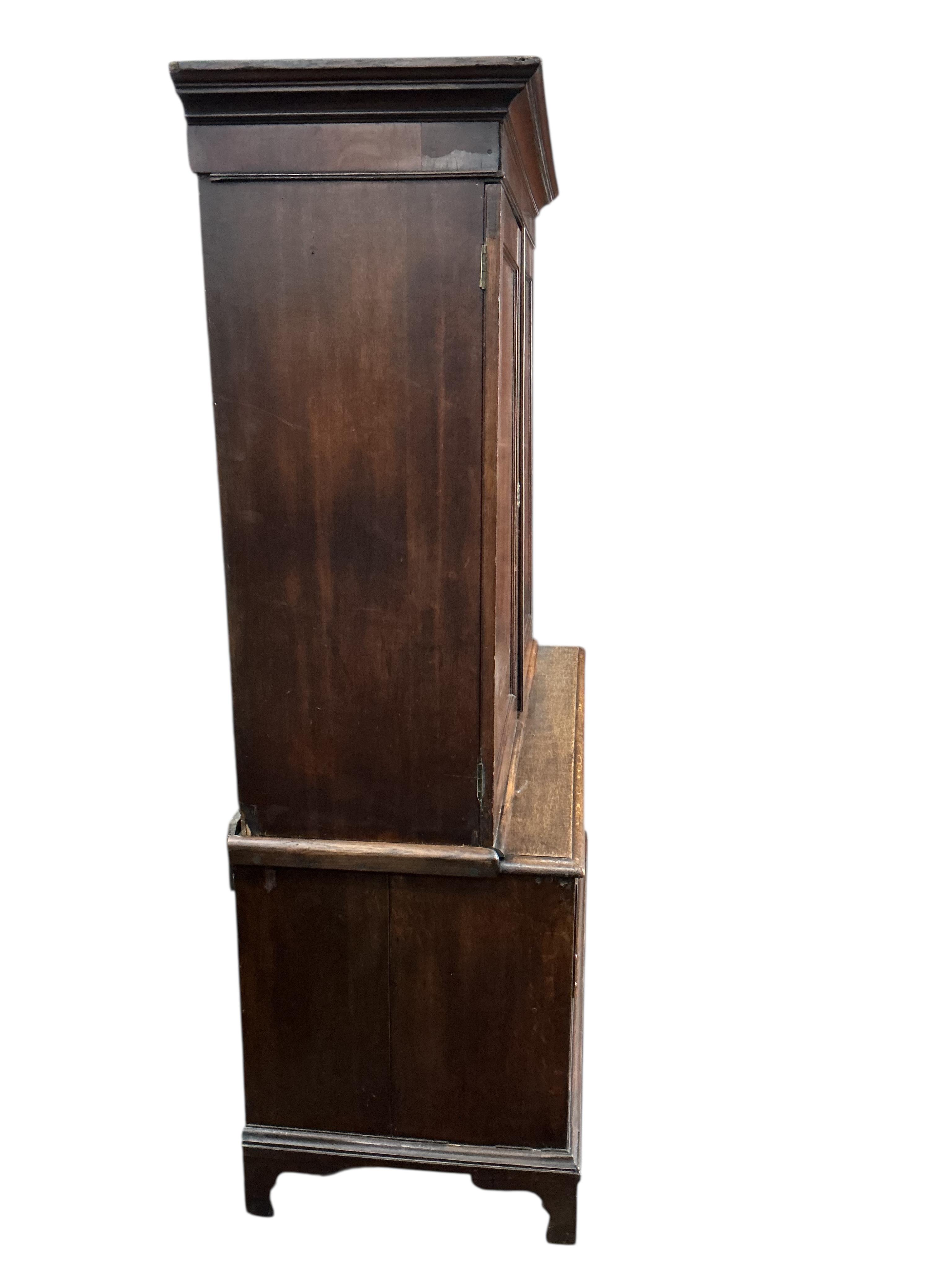 A George III oak mahogany cabinet on chest, adapted, width 115cm, depth 53cm, height 171cm
